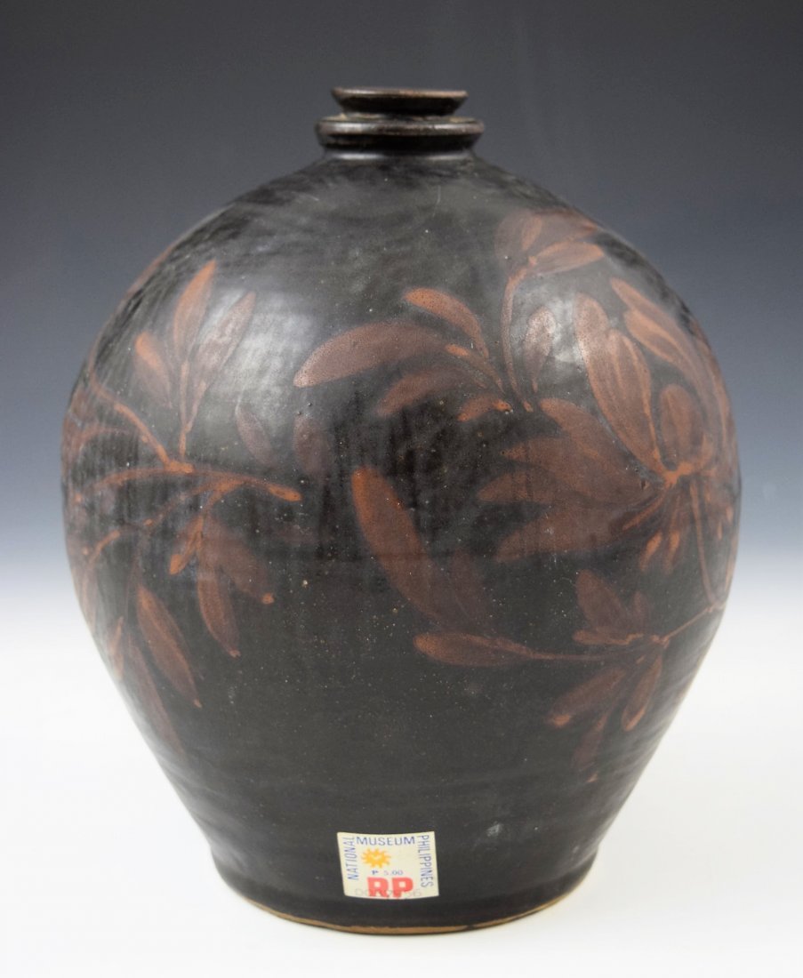 A Rare Jin Dynasty Black & Russet Cizhou Type Jar (1 of 4)