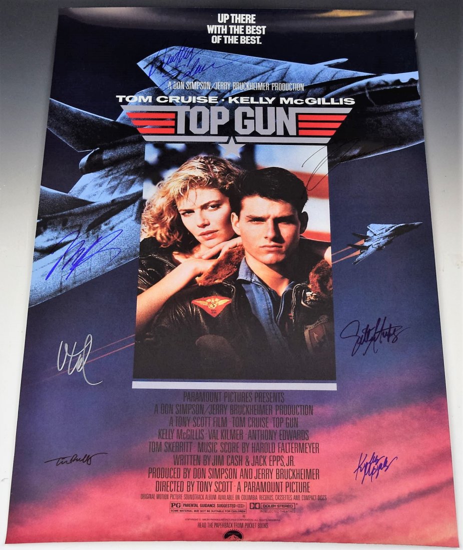 Top Gun Cast Signed Movie Poster: Signed by: Tom Cruise, Kelly McGillis, Val Kilmer, Anthony Edwards, Tom Skerritt, Tim Robbins and Meg Ryan Measures: 20 x 29 inches Comes with COA