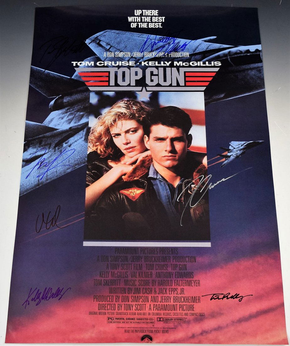 Top Gun Cast Signed Movie Poster: Signed by: Tom Cruise, Kelly McGillis, Val Kilmer, Anthony Edwards,, Tom Skerritt, Tim Robbins, Meg Ryan Measures: 19 3/4 x 29 COA Included