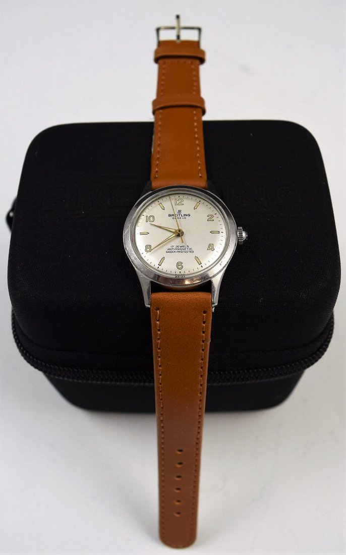 Vintage Breitling Watch: A vintage Breitling watch with service case