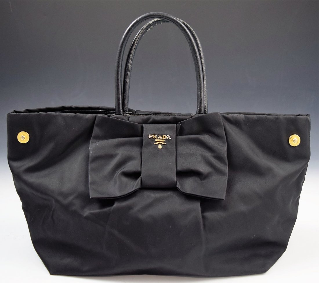 Prada Handbag: Prada issued handbag Measures: 16 x 9 x 6 inches