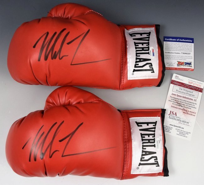 2 Mike Tyson Gloves Autographed: 2 Everlast boxing gloves signed by Mike Tyson, COA included for each