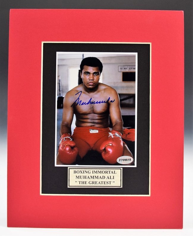 Muhammad Ali Signed Photo: A photo of Muhammad Ali Signed by Muhammad Ali Measures: 8 x 10 inches COA included