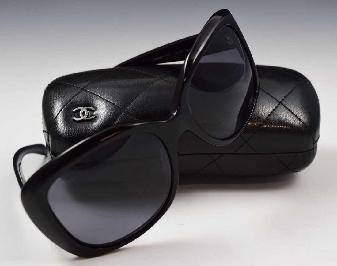 Chanel Sunglasses: Chanel issued sunglasses with original case