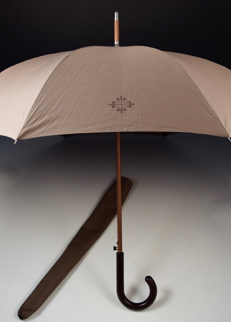 Patek Philippe Umbrella: Patek Philippe umbrella with curved handle and cover
