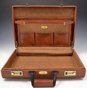 Emilio Pucci Leather Briefcase: Vintage leather Emilio Pucci briefcase with lock Measures: 18 x 12 1/2 x 3 inches