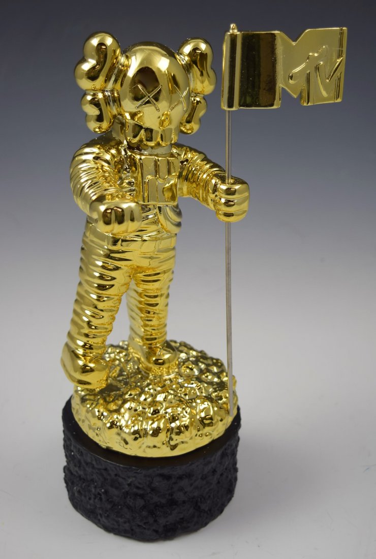 Kaws MTV Moonman Sculpture: Kaws MTV Moonman Sculpture Measures: 11 x 4 inches.
