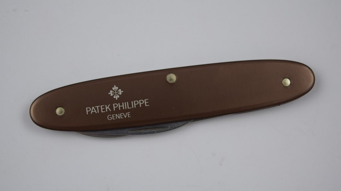 Patek Philippe Pocket Knife: Patek Philippe standard brown pocket knife
