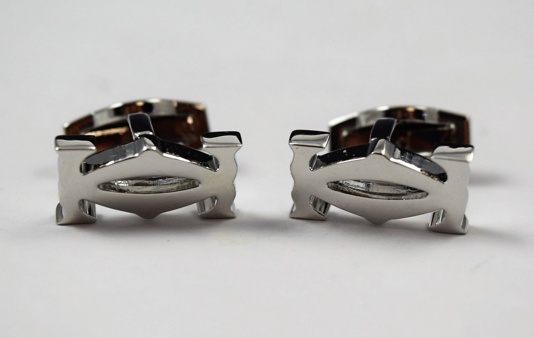 Cartier Cufflinks: Cartier issued cufflinks