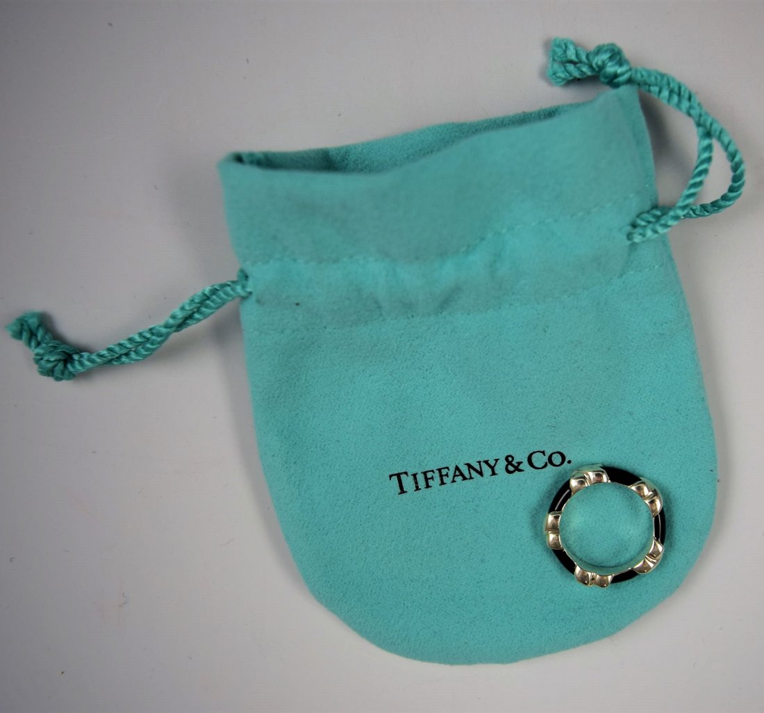 Tiffany & Co Sterling Silver Ring: Tiffany and Company sterling silver ring with dust bag Size: 4 1/2