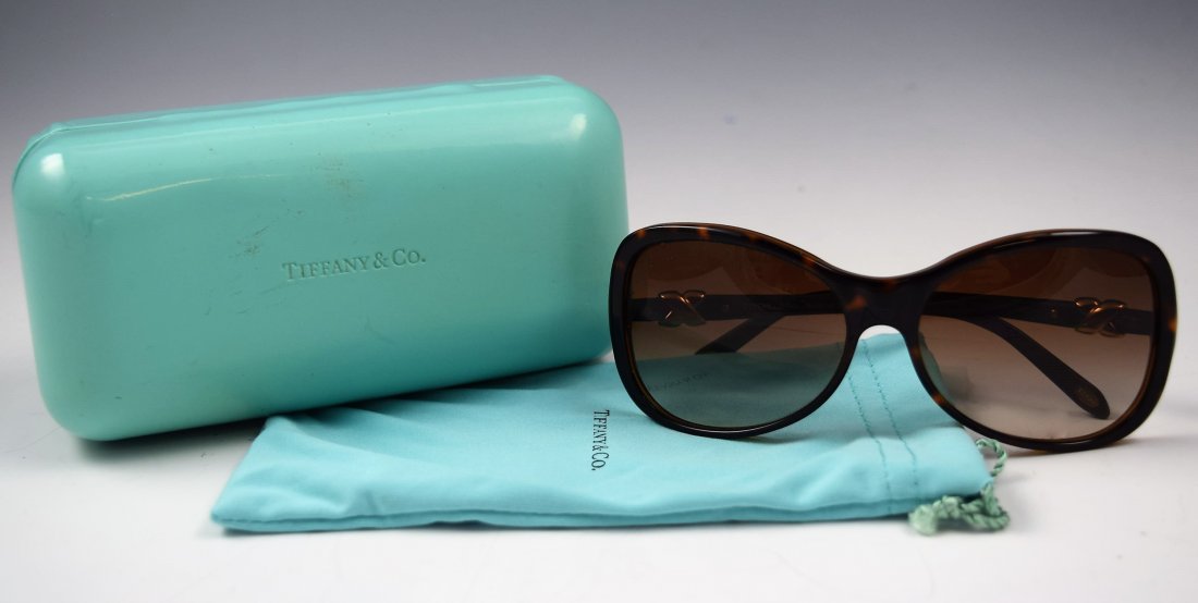 Tiffany & Co Sunglasses: Tiffany and Company issued womens brown tortoise sunglasses with gold accents Original case included