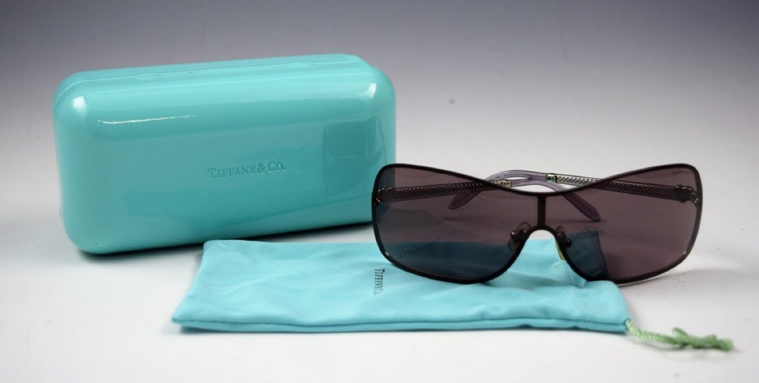 Tiffany & Co Sunglasses: Tiffany and Company issued womens black sunglasses with silver accents Original case included