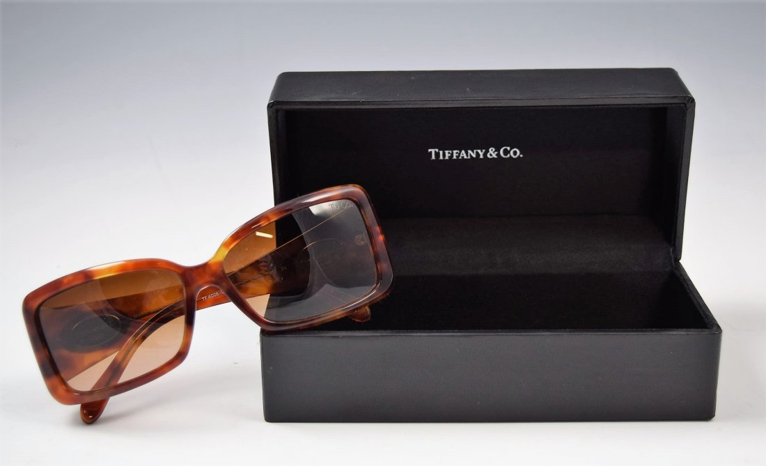 Tiffany & Co Sunglasses: Tiffany and Company issued womens brown sunglasses with silver accents Original case included