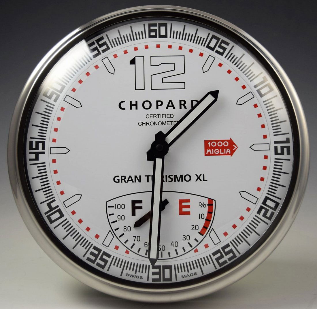 Chopard Showroom Dealer Clock: Dealer showroom clock, Chopard Clock is battery operated, labeling to backside Measures: 12 inches