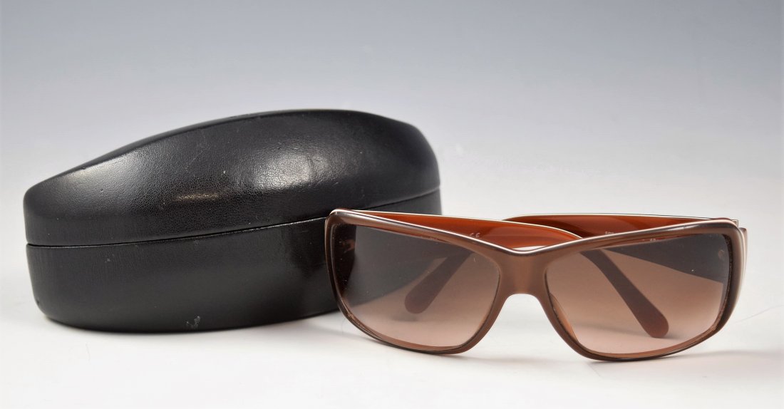 Prada Sunglasses: Prada womens red sunglasses with silver hardware Original case included