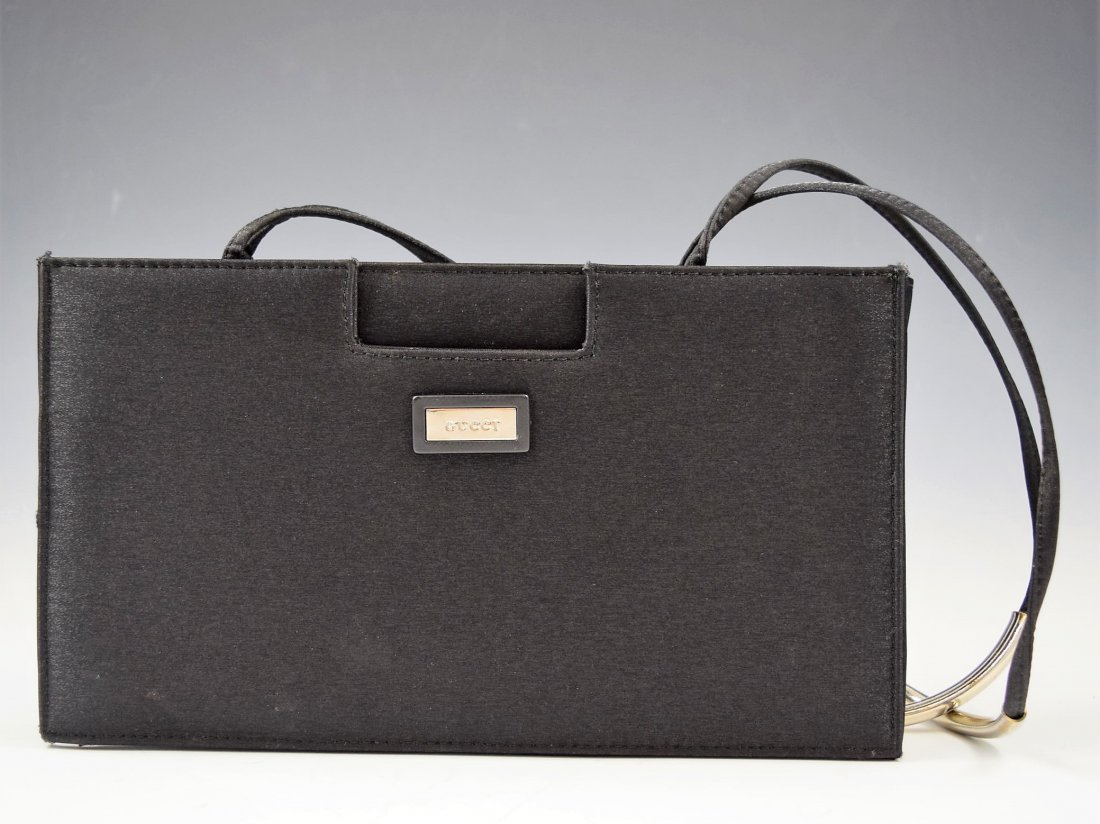 Gucci Handbag: Vintage black Gucci handbag featuring silver tone hardware Measures: 11 1/2 x 6 1/2 x 3 inches