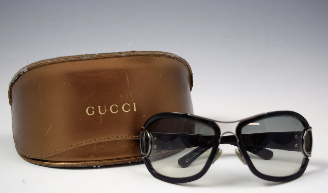 Gucci Sunglasses: Gucci women's sunglasses with silver accents Original case included