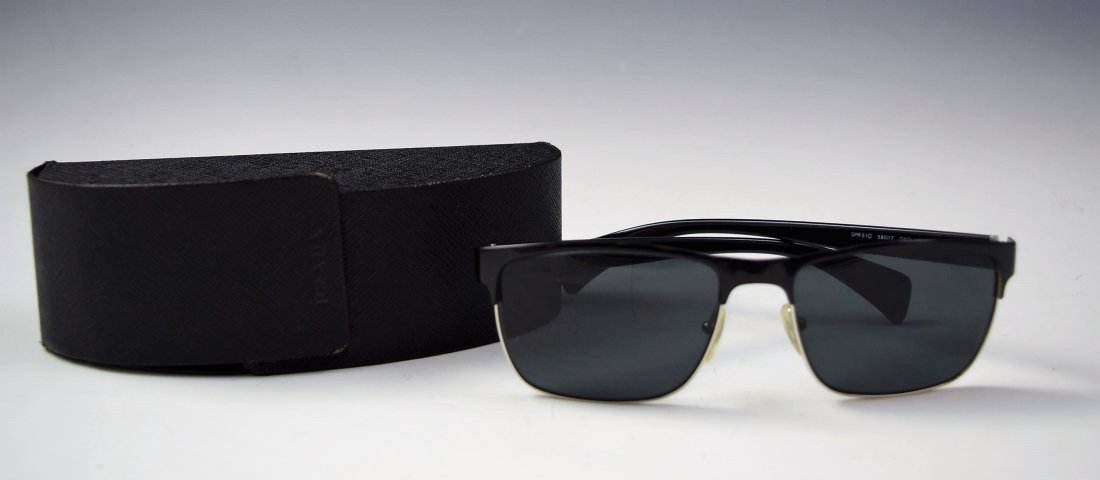 Prada Sunglasses: Prada men's black sunglasses Original box included