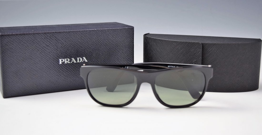 Prada Sunglasses: Prada womens black sunglasses with silver logo accent Original case and box included