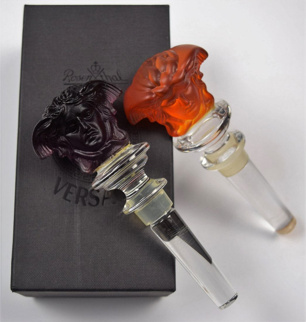 Versace Wine Stoppers: Two Versace issued Rosenthal amethyst crystal Medusa wine bottle stoppers