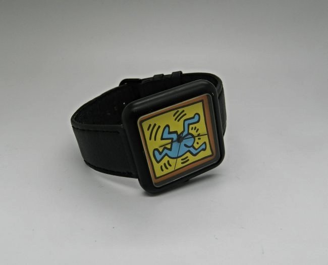 Keith Haring Limited Edition Dancing Figure Watch: Genuine leather band with a quartz movement Overall size: 9 inches in lenght (full band size)