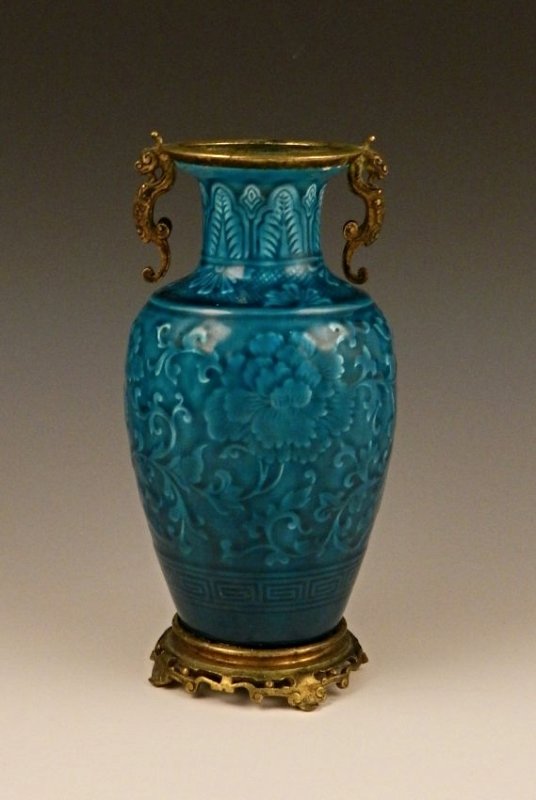 Theodore Deck Turquoise Glazed Floral Vase: Measures: 8 inches in height, 4 inches in length A turquoise glazed french vase with Griffin style bronze handles & a pierce footed base, circa early 20th century Signed on bottom