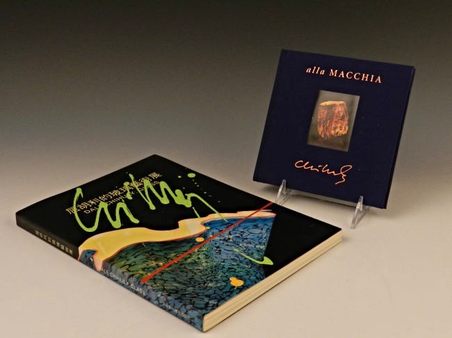 2 Dale Chihuly Acrylic Signed Books: 1. Dale Chihuly: Art Glass Size: 11 1/2 x 8 1/2 inches Signed in acrylic paint by Chihuly on front cover 2.Alla Macchia, Chihuly Size: 6 1/2 x 6 1/2 inches Signed in acrylic paint inside front cover b
