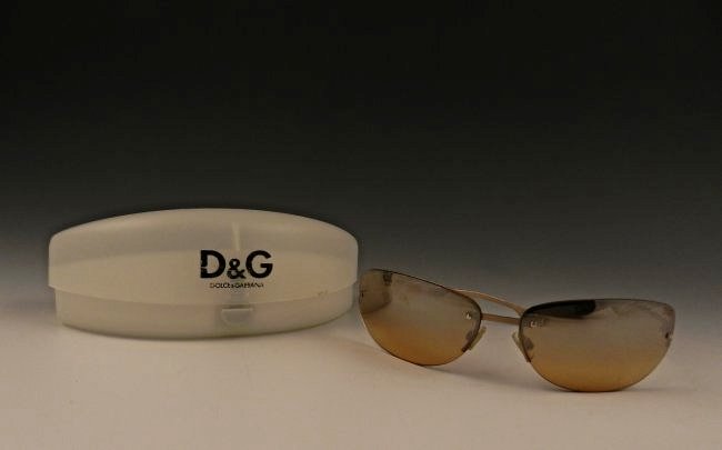 Ladies Dolce & Gabbana Sunglasses: Light colored ladies Dolce & Gabbana sunglasses with original case Made in Italy