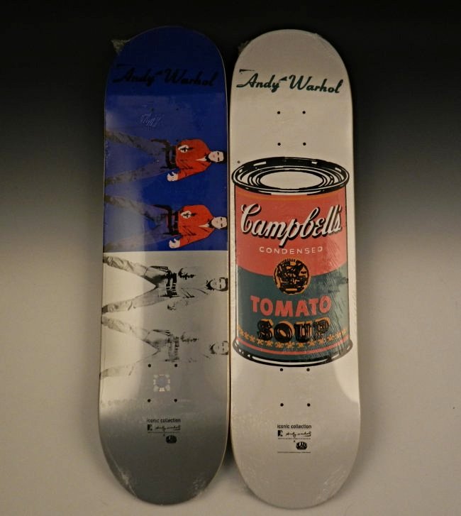 After Andy Warhol Skateboard Decks: Acrylic, transfer printed plywood Pair of 2 limited edition works by Warhol, produced by Alien Workshop Campbells Soup, Elivs Presley Measures: 32 inches each. Each signed on backing with copyright fr