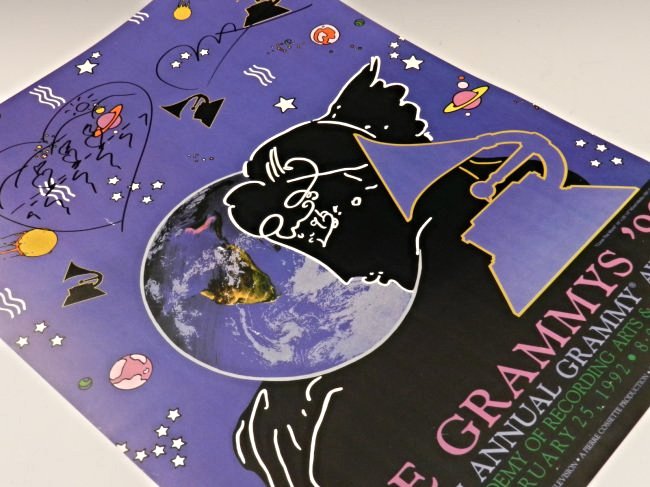 Signed Peter Max Poster: The Grammys '92 With a signed marker drawing of a heart in the upper left Measures: 23 x 18 inches