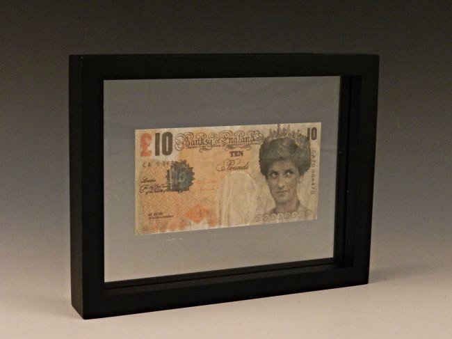 Banksy Di Faced Tenner 10 Pound Note: Measures: 5 1/2 x 3 1/2 inches Provenance: Acquired in 2004 by owners uncle who worked security at the 2004 Notting Hill Carnival where the banksy tenner had been debuted.