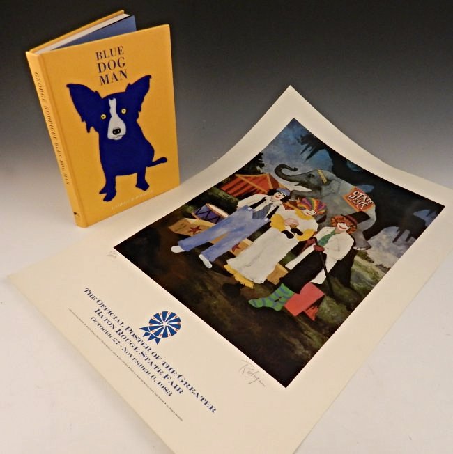George Rodrigue: Lot of two signed Rodrigue works, book and poster lithograph Both signed by Rodrigue with poster being from a limited edition of 351 of 1500 total Poster Measures: 29 x 19 1/2 inches unframed