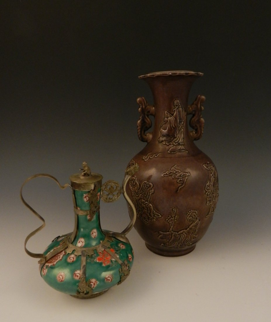 Pair of Chinese Vases: A brown glaze vase depicting Mandarin figures some playing instruments Underside marked with a six-character Qing Dynasty mark, measures: 10 inches in total height A green dragon silver plated tea pot