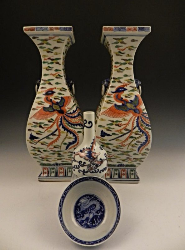 A Grouping of Chinese Dragon Motif Vases & Bowls: Dragon theme bottle vase in blue, red Underside marked with a six-character, Yongzheng reign mark, measuring: 5 1/2 inches tall Blue/white dragon bowl, Underside marked with a Kangxi reign mark, measu