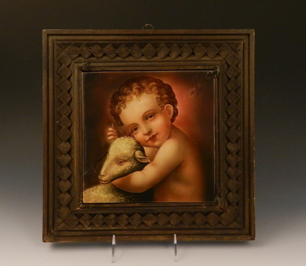 KPM Porcelain Plaque: A fine KPM hand painted porcelain plaque Depicting young child holding lamb Measures: 13 x 13 inches