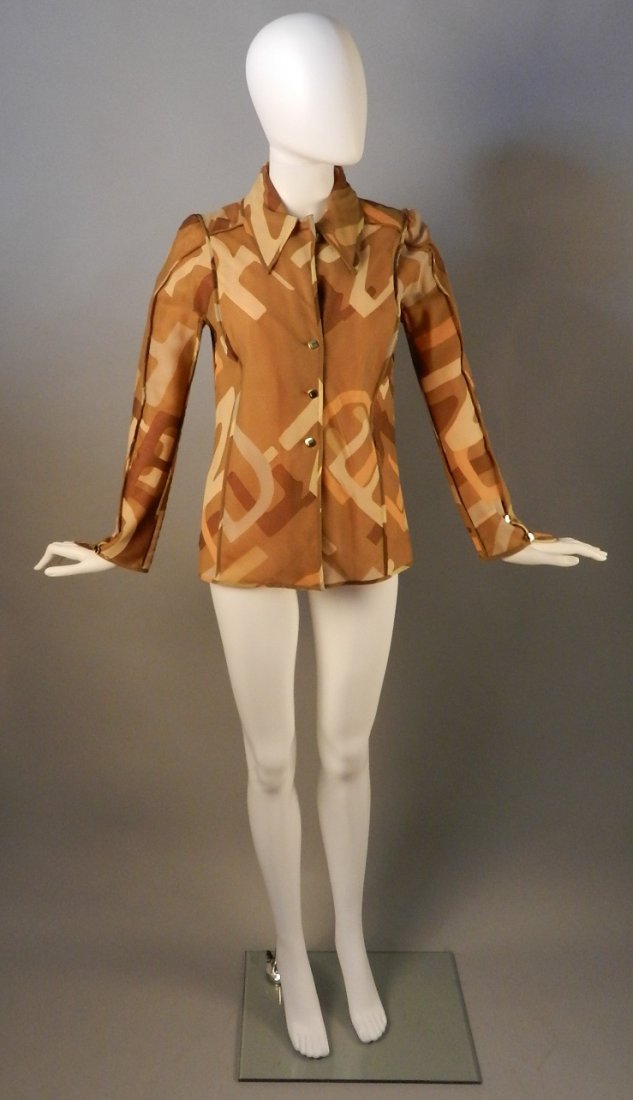 Vintage Fendi Silk Blouse: Tan multicolor blouse features a collar, long sleeves, button front, and a full lining Size: 40 Measurements: Total Length: 25.25 in.; Cross Chest: 17.5 in.; Cross Back: 13 in.; Shoulder: 3.75 in.; Sl