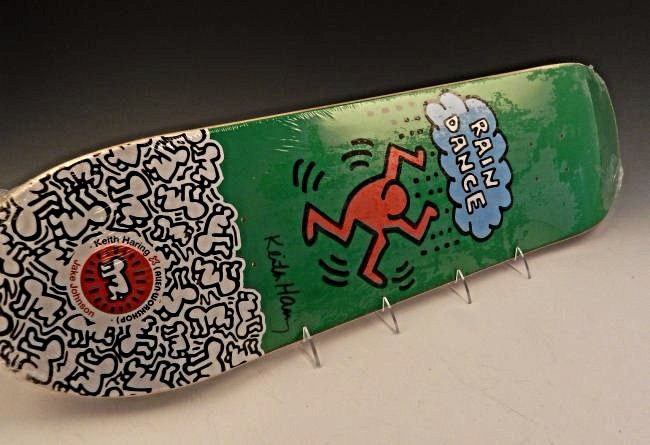 After Keith Haring Skateboard Deck: Acrylic, transfer printed plywood Limited edition work by Haring, produced by Alien Workshop Measures: 32 inches Signed & stamped from the Keith Haring foundation