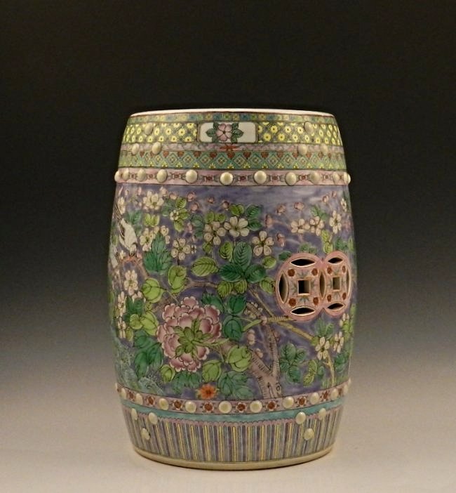 Chinese Famille Rose Garden Seat: 19th/20th century Depicting birds and a floral pattern Measures: 20 inches in height