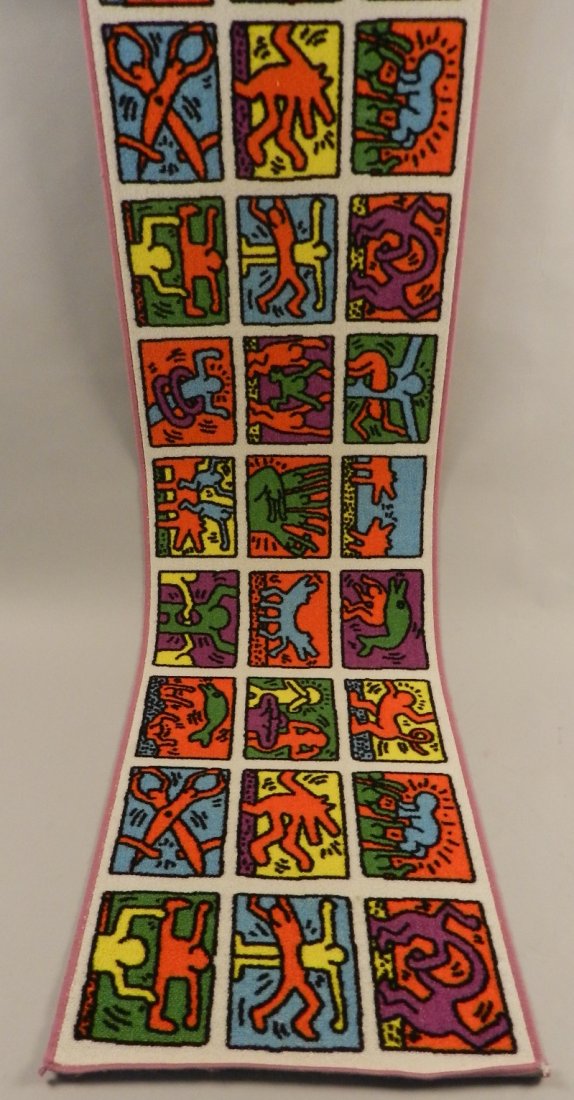 Keith Haring Rug: Large Keith Haring hanging rug depicting 30 images by Haring Measures: 22 1/2 x 90 inches Copyright tag - Estate of Keith Haring on backside, licensed additionally Artestar, New York