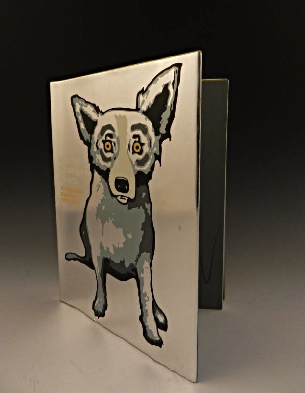 George Rodrigue Signed Catalogue Raisonne: A signed copy of the George Rodrigue catalogue raisonne book Signed by both George & his wife Wendy Measures: 12 x 9 inches