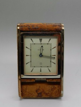 1940's Lecoultre 8 Day Travel Clock: Measures: 4 1/2 inches 8 day Lecoultre leather travel clock