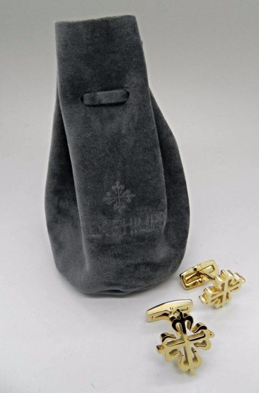 Patek Philippe Cufflinks: (2) Patek Philippe cufflinks with original bag