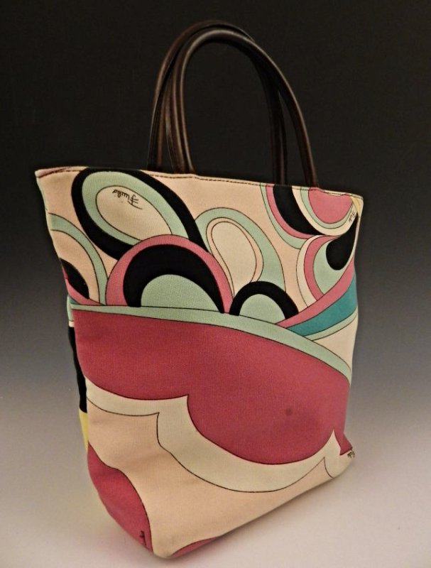 Emilio Pucci Handbag: A multi-colored Pucci canvas leather handbag Measures: 11 1/2 inches in height (with strap), 10 inches across