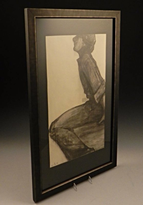 Elaine de Kooning: (American, 1919-1989) A 20th century charcoal sketch of a sitting woman Measures: 32 x 19 inches, framed, DOA: 23 x 13 inches Signed lower left