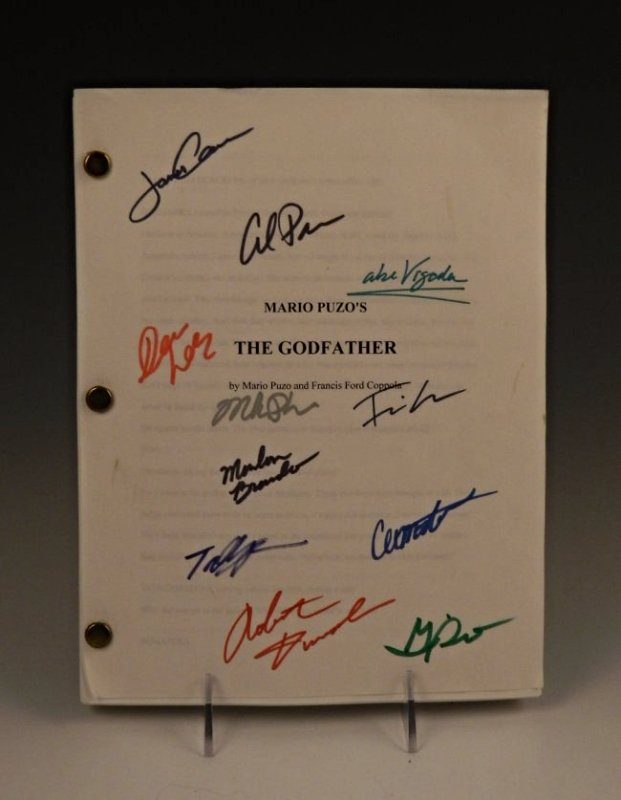 Godfather Cast Signed Movie Script: Godfather movie script signed by the cast 11 signatures total including - Al Pacino, Marlon Brando, Robert Duvall Measures: 11 x 8 inches