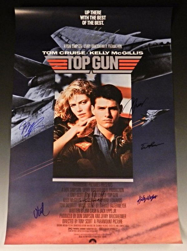 Top Gun Cast Signed Movie Poster: Signed by: Tom Cruise, Kelly McGillis, Val Kilmer, Anthony Edwards, Tom Skerritt, Tim Robbins and Meg RyanMeasures: 20 x 29 inchesComes with COA