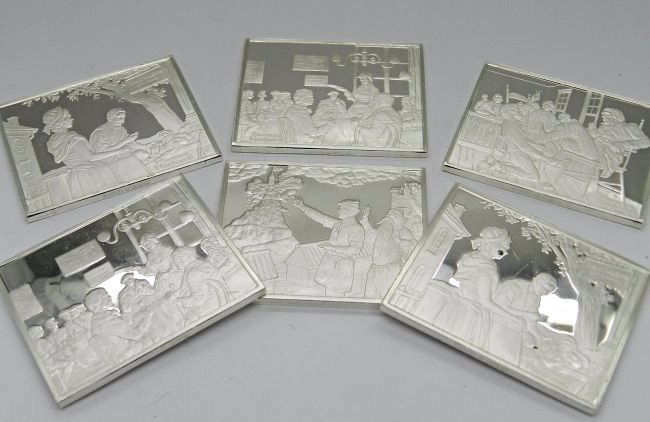 Grouping of Norman Rockwell Silver Plaques: (6) Sterling silver Norman Rockwell plaques Measures: 2 x 1 1/2 inches each Weighing 1.6 oz. each