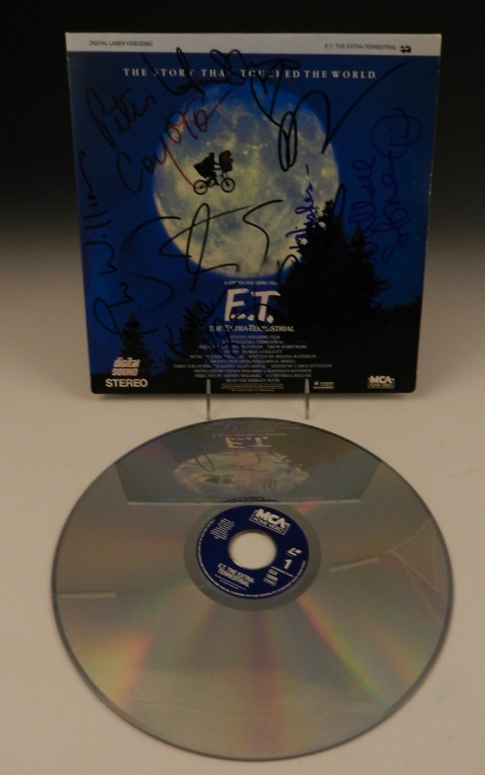 Original E.T. Cast Signed LaserDisc: E.T. cast signed LaserDisc cover 7 Signatures include - Steven Spielberg, Drew Barrymore, Kathleen Kennedy, John Williams, Peter coyote, Dee Wallace, Henry Thomas