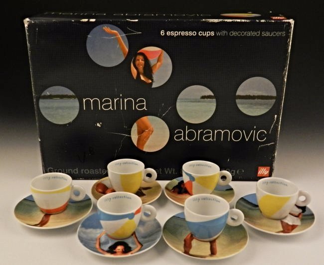 Marina Abramovic: Limited edition Illy espresso cup set, Marina Abramovic Measures: 2 inches (each cup), 5 inches (each saucer) Never before used, original box set with each cup and saucer stamped on bottom