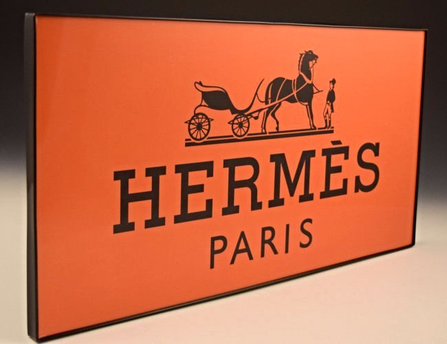 Hermes Advertising Sign: A rare Hermes plexiglas advertisement sign Measures: 24 x 12 inches